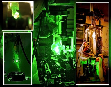 Combined Optical and Nuclear Magnetic Resonance (NMR) setup for hyperpolarizing nuclear spins in diamonds at room- temperature. During the polarization transfer phase, the entire single-crystal diamond (red in the picture) is irradiated with green laser light and microwaves underneath the NMR magnet at a low magnetic field. The hyperpolarized diamond is then shuttled into a high field superconducting magnet, for a directly detected NMR experiment on the 13C spins.